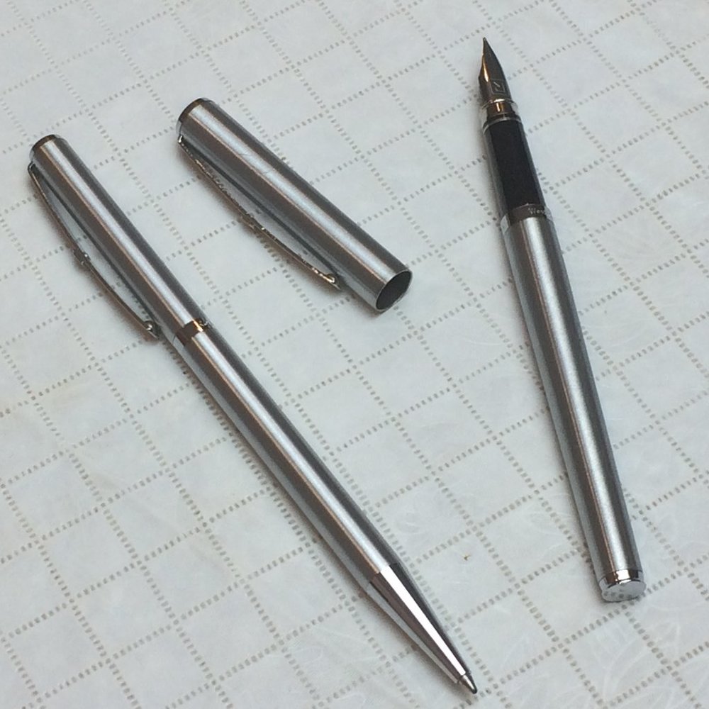 Rowenta Set of stainless steel fountain pen and roller ball pen from Germany